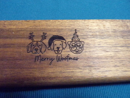 Acacia wood Cutting/Charcuterie board engraved with Merry Woofmas!