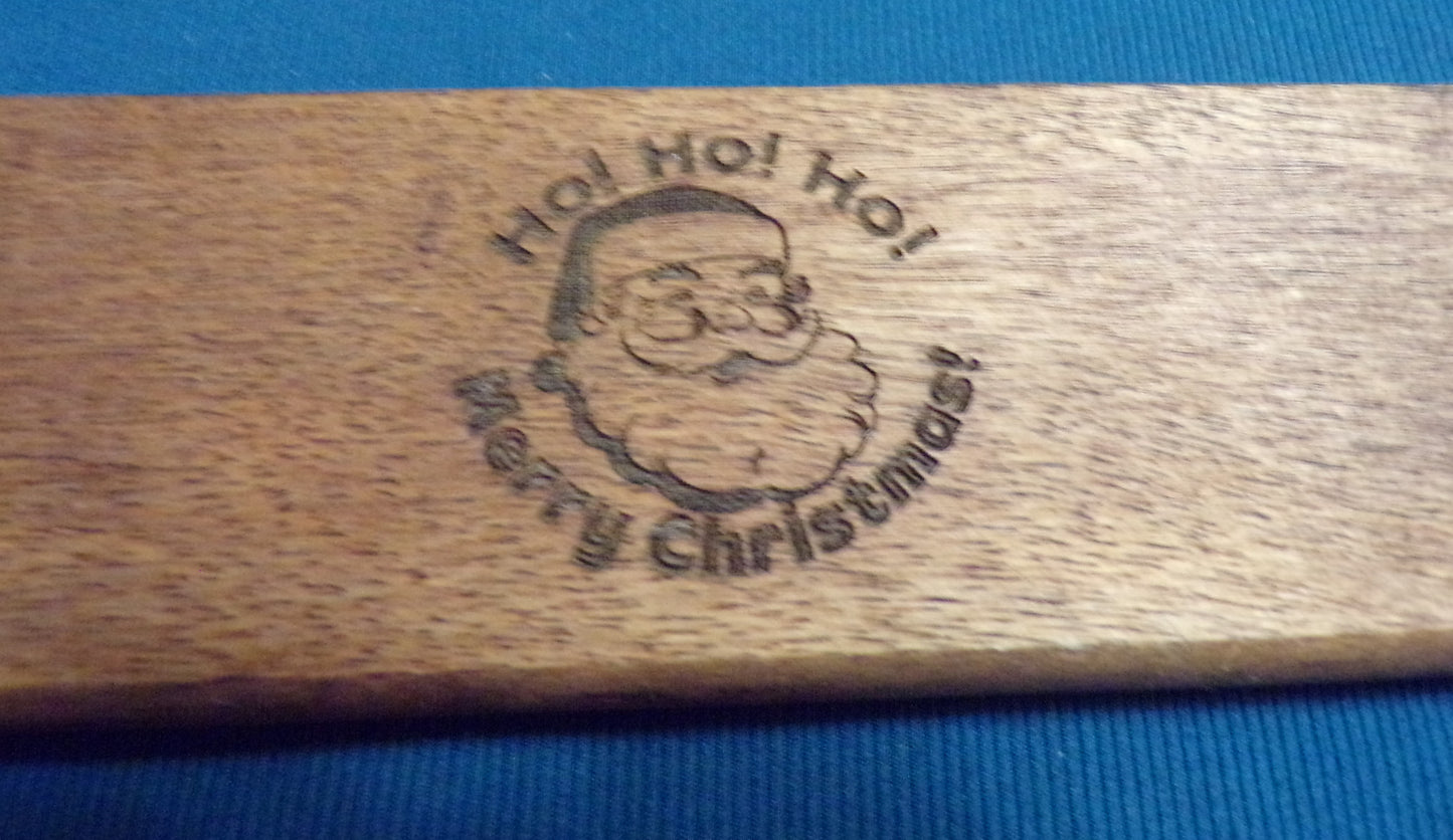 Acacia wood Cutting/Charcuterie board engraved with Santa