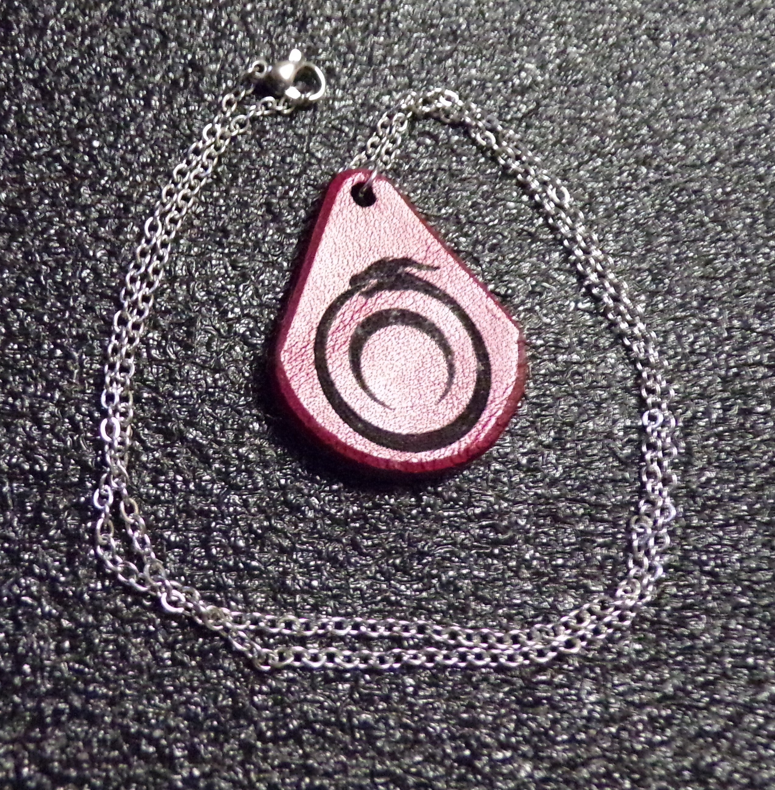 Styx Leather Amulets