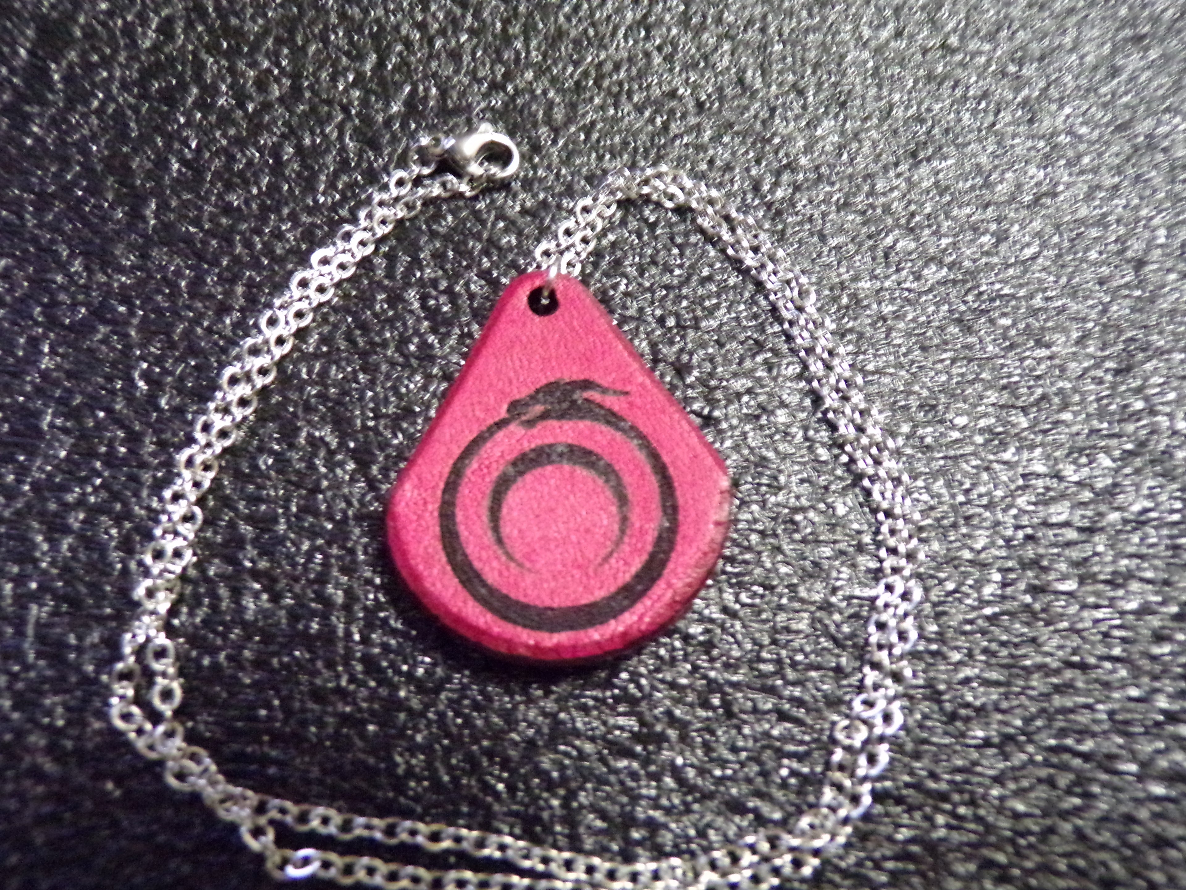 Styx Leather Amulets