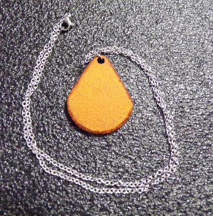 Styx Amulet Orange Leather with Stainless chain