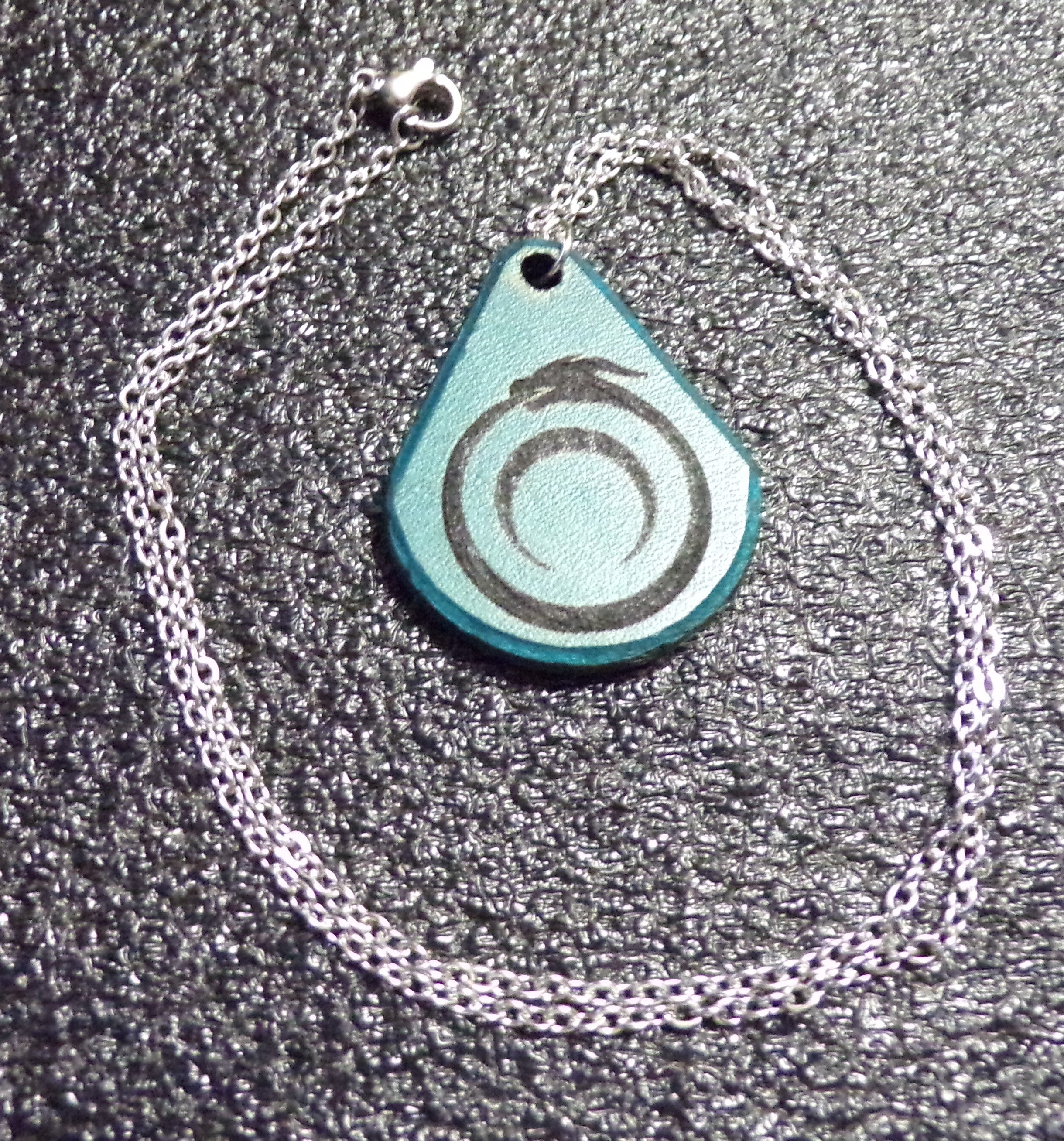 Styx Leather Amulets