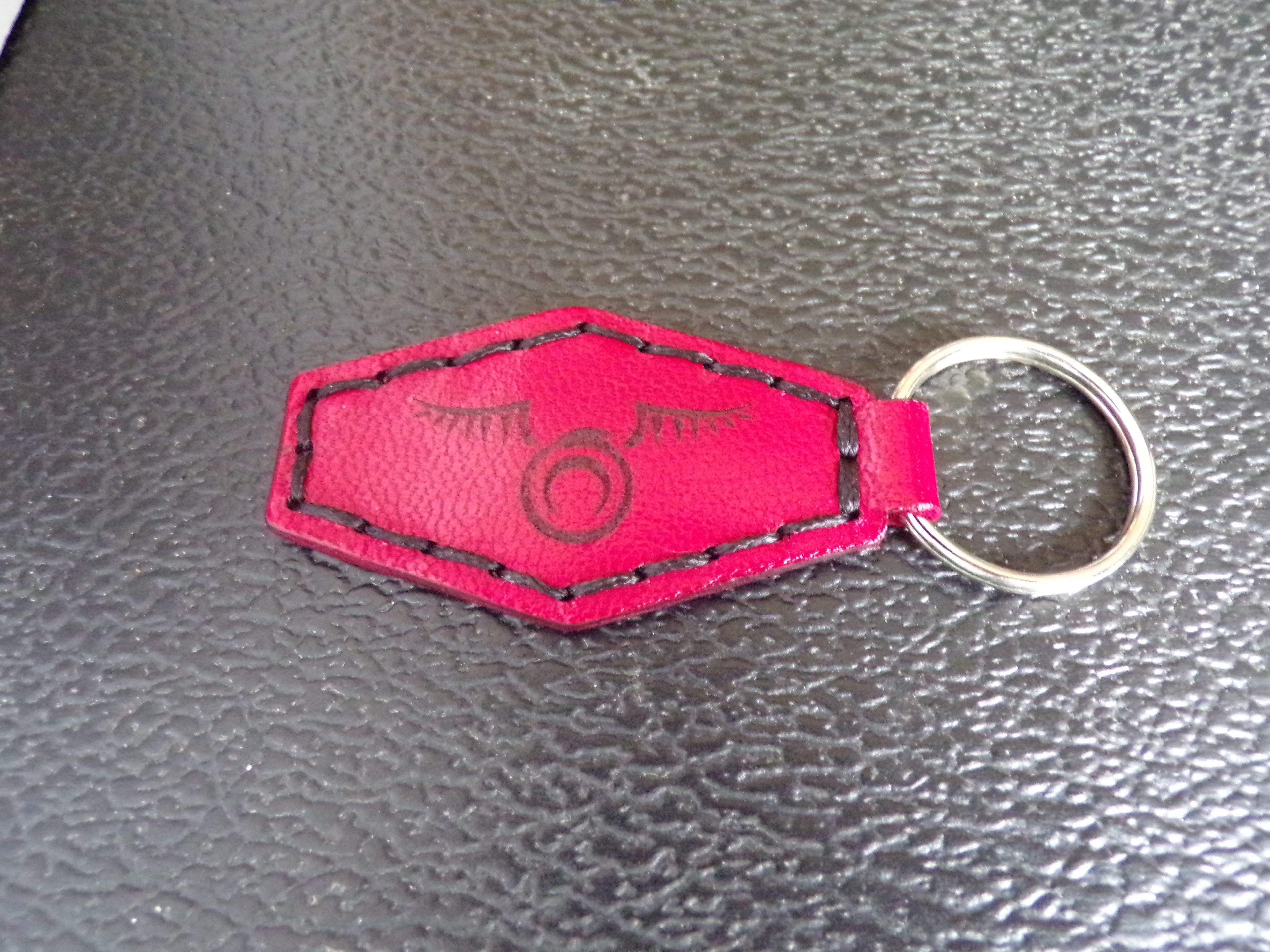 Styx Two-Sided Leather Keychains