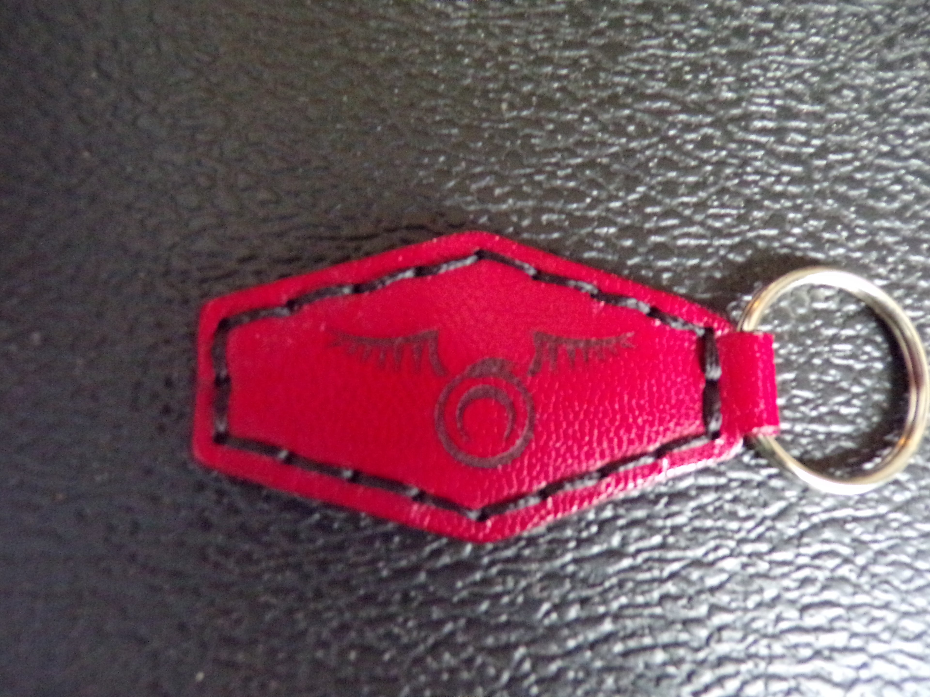 Styx Two-Sided Leather Keychains