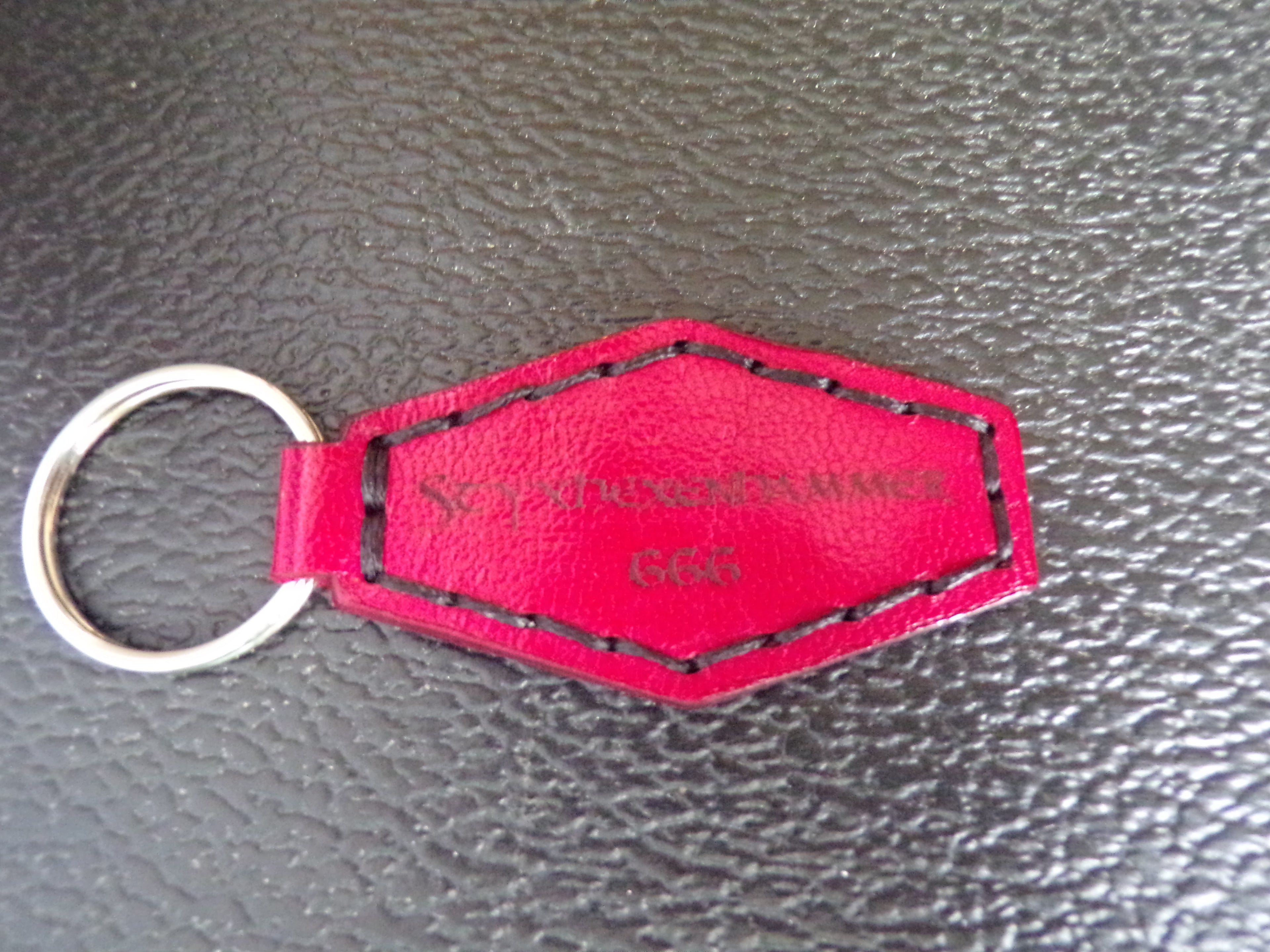 Styx Two-Sided Leather Keychains