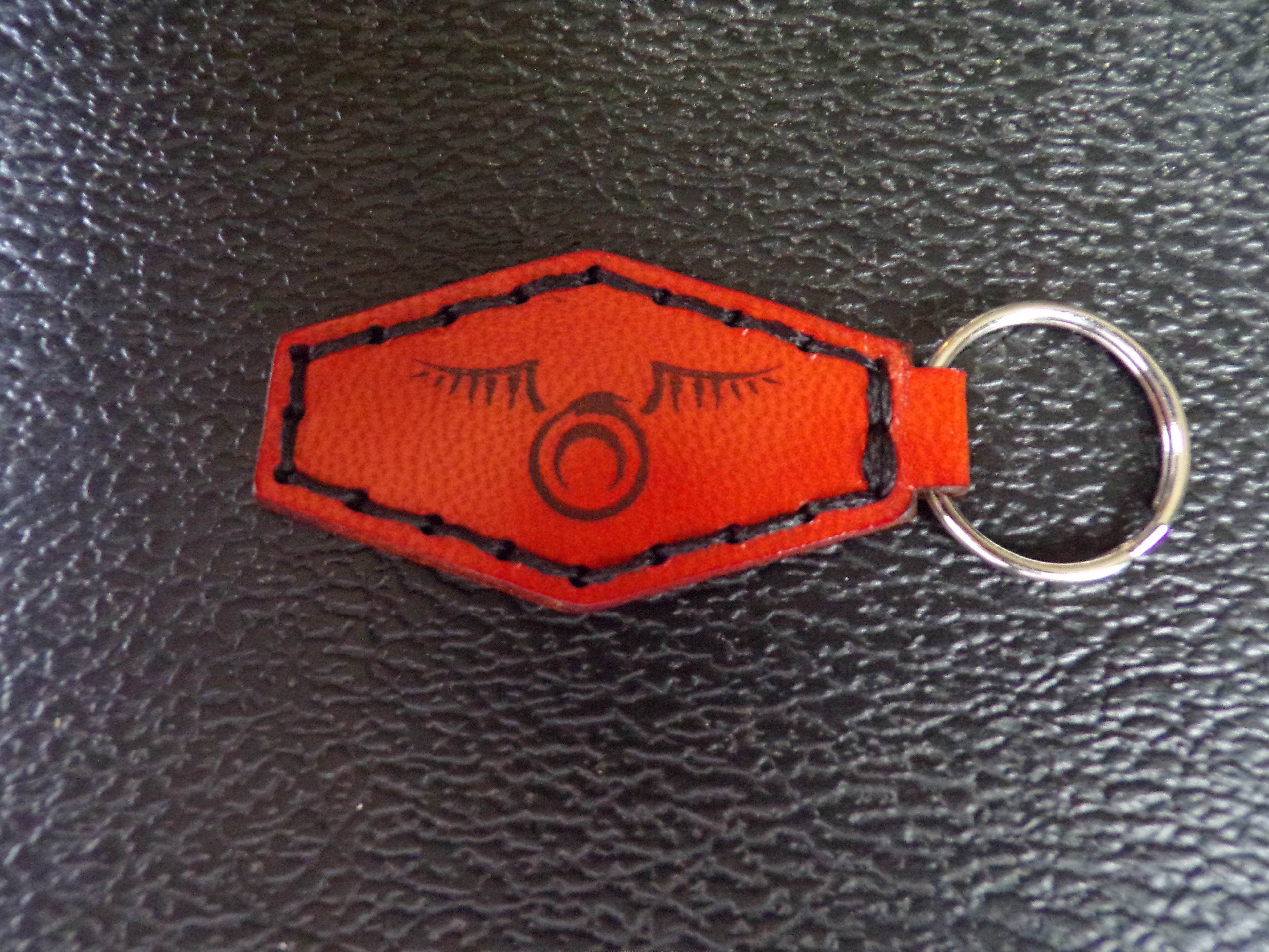 Styx Two-Sided Leather Keychains