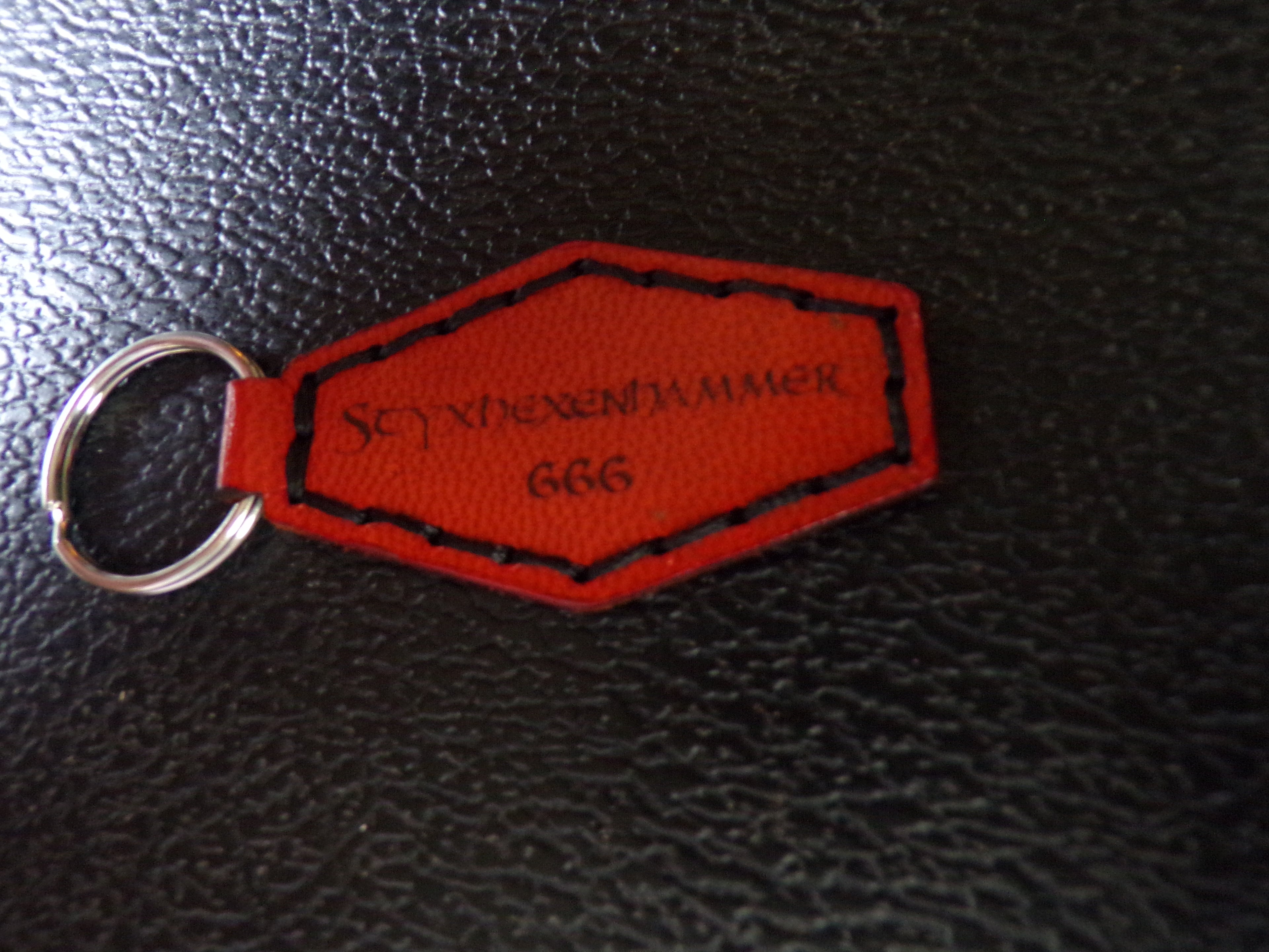 Styx Two-Sided Leather Keychains