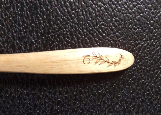 Acacia wood spoon with a Vine and Ouroboros