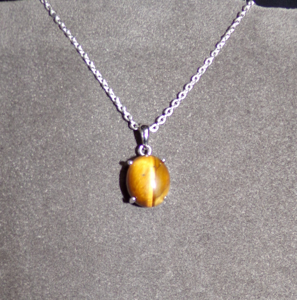 Collar de ojo de tigre con engaste y cadena de plata de ley